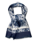 Exclusive Ottimare scarf The Leo for men and woman in circular satin in cyanotype blue colors. Handmade in the Netherlands, with a fringe in the dark blue border.