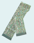 Scarf for ladies and gentlemen named Gordons Flowers. This exclusive item is handmade by Ottimare, with flowers in mainly green, with pink and aqua accents.