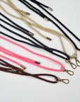 Lanyard with cord for carrying a fan in five colors with gold colored closure. Ottimare