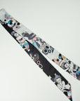 Beautiful deep black satin scarf designed and handmade by Ottimare in the Netherlands. The backside is n a soft grey tone. The ribbon shows four dansers with pink and blue accents.