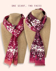 One Ottimare frilly scarves with two different colour patterns on mannequins against a beige background. Hand-made in the Netherlands