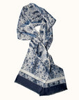 Exclusive Ottimare double-sided scarf for men and woman in circular satin in cyanotype blue colors. Handmade in the Netherlands, with a fringe in the dark blue border.