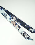 Very elegant long scarf designed and handmade by Ottimare, a Dutch designer. One side is navy blue, the other soft blue. The dancers on the scarf have various accent colors, like purple and cobalt.