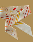 Ottimare twilly sjaal van Tencel twill met camel en geel rood oranje kleuren. Handgemaakt in Nederland.