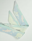 Beautiful soft satin Ottimare ribbon scarf with fishing polar bears in pastel colors with salmon accents.