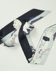 Small scarf from Ottimare with fishing polar bears and fishes in blue and white with salmon accents. Dutch design. Made in Holland.