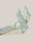 Beautiful small satin Ottimare ribbon scarf with fishing polar bears in sand, turquoise and light blue colours with salmon accents.