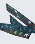 Grey and petrol green tangram scarf with two different side. Extra long ribbon cravat, wrapped twice with a bowtie. Ottimare.