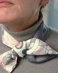 Model wearing the pink dolfin grey taupe grey Thangka scarf - Ottimare