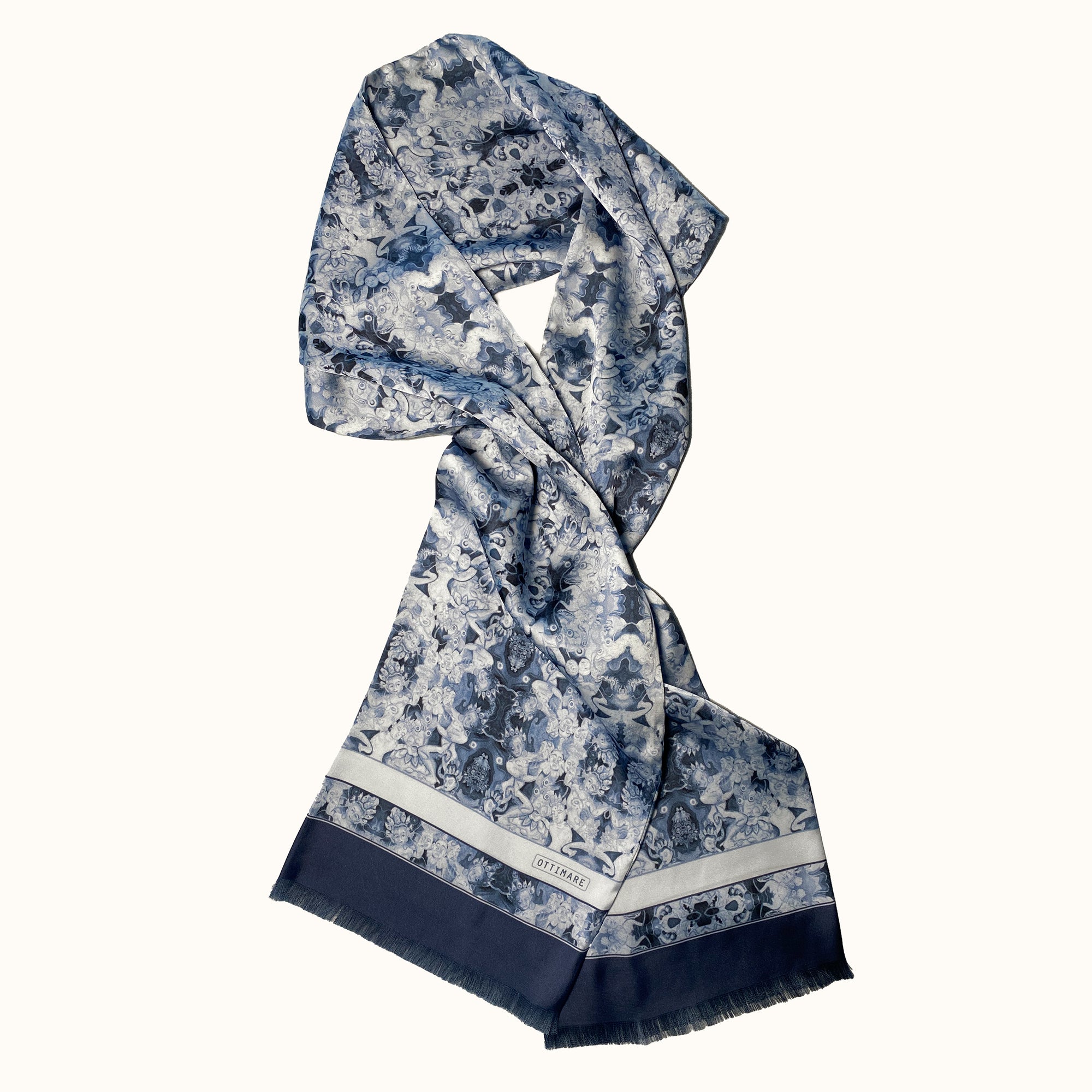 Exclusive Ottimare double-sided scarf for men and woman in circular satin in cyanotype blue colors. Handmade in the Netherlands, with a fringe in the dark blue border. 