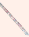 Ottimare floral patterned ribbon twilly scarf on a white background. Handmade in the Netherlands.